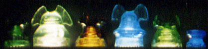 Close-up of Colorful Glass Insulators in Different Shapes and Sizes